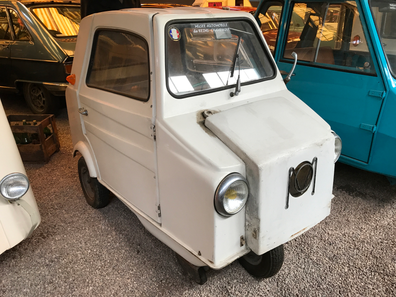 The infamous Mini Comtesse, a teeny “sans permis” car from the 70's that could be driven without a driver’s license. It’s a 3-wheeler, but if you notice, it has little training wheels to keep it from tipping over.